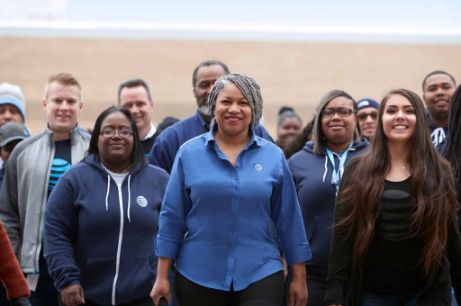at&t employees grouped together smiling