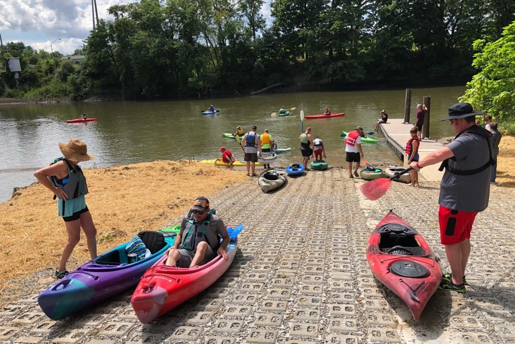 Kayaks on river ramp